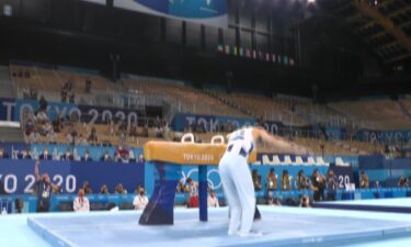 Whitlock defends pommel horse title