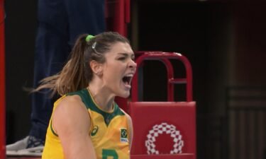 Member of the Brazil women's volleyball team cheers