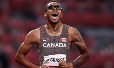 Andre De Grasse lets out a scream after a successful race