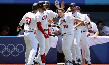 USA baseball celebrates against the Dominican Republic