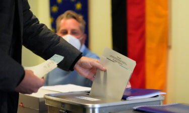 A man casts his vote in Germany's national parliamentary election at a polling station in Berlin