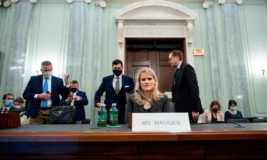 Former Facebook employee Frances Haugen prepares to leave at the end of a Senate Committee on Commerce