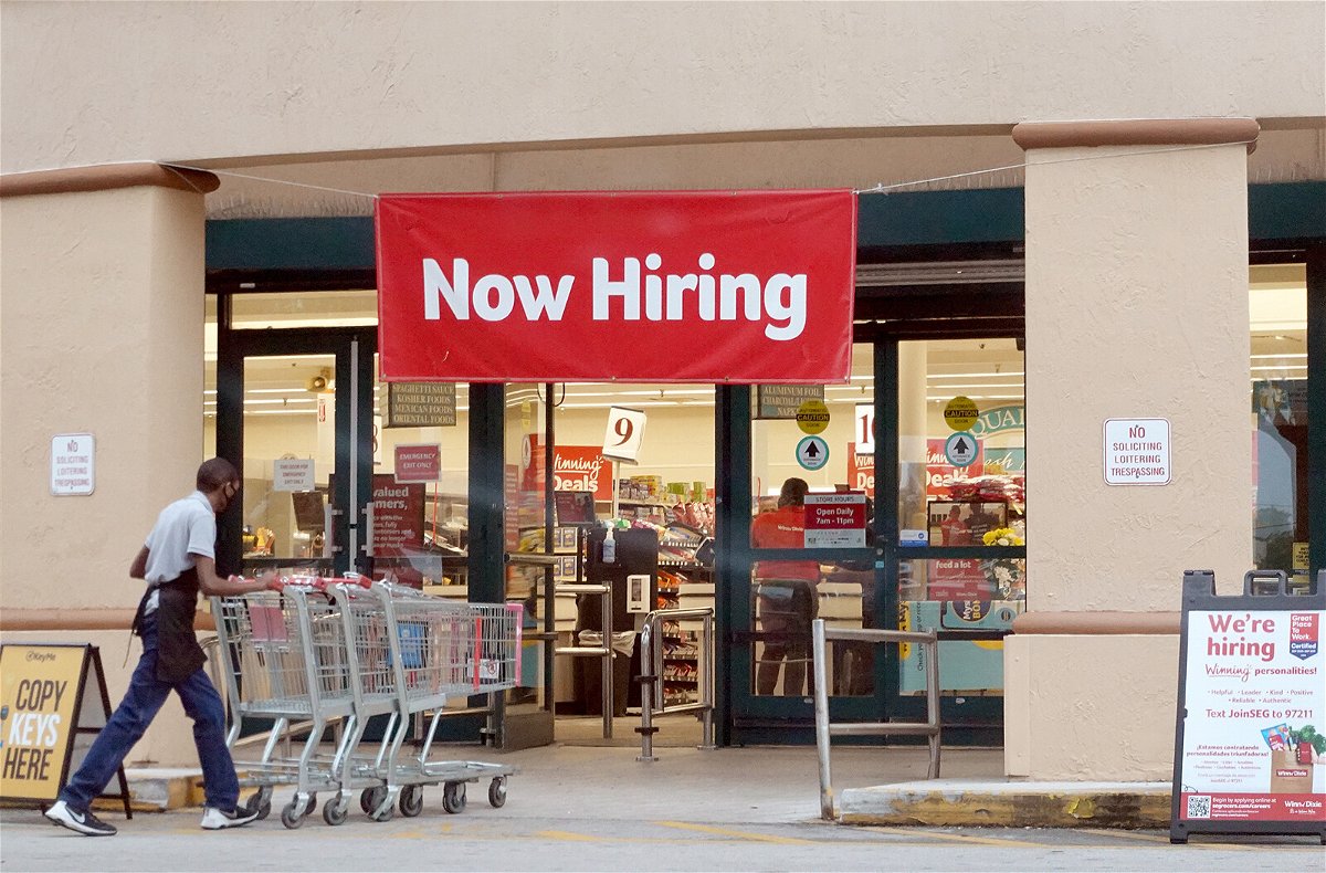 <i>Joe Raedle/Getty Images</i><br/>A Now Hiring sign hangs near the entrance to a Winn-Dixie Supermarket on September 21 in Hallandale