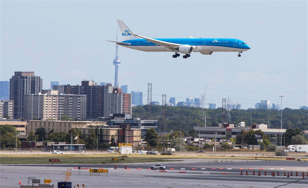<i>Zou Zheng/Xinhua/Getty Images</i><br/>Canada is launching a standardized proof of vaccination credential for both domestic and international travel. An airplane is seen landing in Mississauga