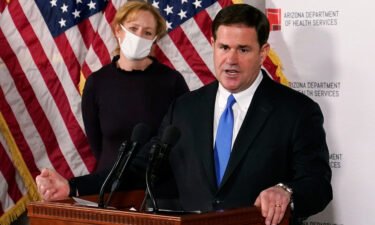 The Treasury Department sent a warning to Arizona's Republican governor Tuesday about the state's use of federal Covid-19 relief funds for grant programs that circumvent school mask requirements.