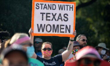The Department of Justice will ask the Supreme Court to step in and block a controversial Texas law that bars most abortions after six weeks of pregnancy. Demonstrators are shown here rallying against anti-abortion and voter suppression laws at the Texas State Capitol on October 2