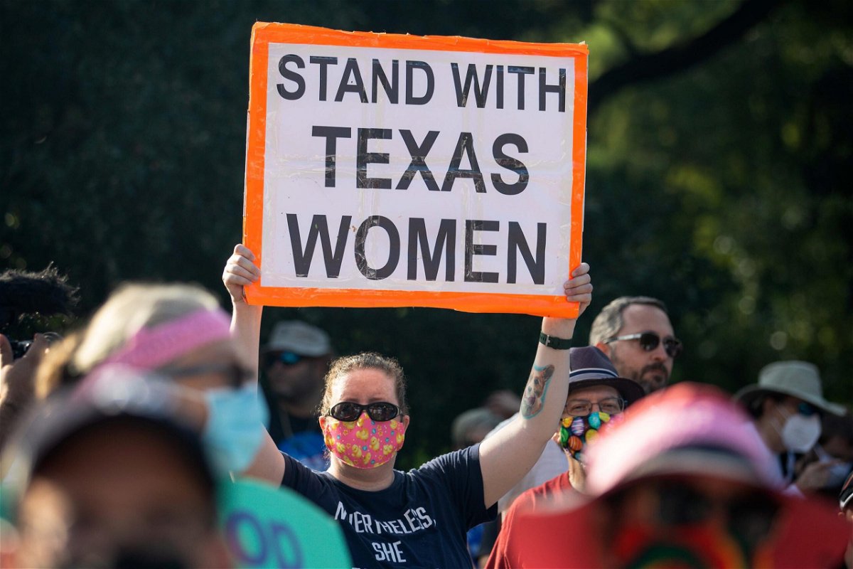 <i>Montinique Monroe/Getty Images</i><br/>The Department of Justice will ask the Supreme Court to step in and block a controversial Texas law that bars most abortions after six weeks of pregnancy. Demonstrators are shown here rallying against anti-abortion and voter suppression laws at the Texas State Capitol on October 2