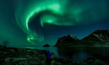 A person watches Northern Lights on March 9