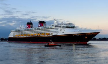 Disney Cruise Line announced that all passengers ages 5 and up must be vaccinated against Covid-19 beginning in January. Disney Magic's cruise is shown here outside London.