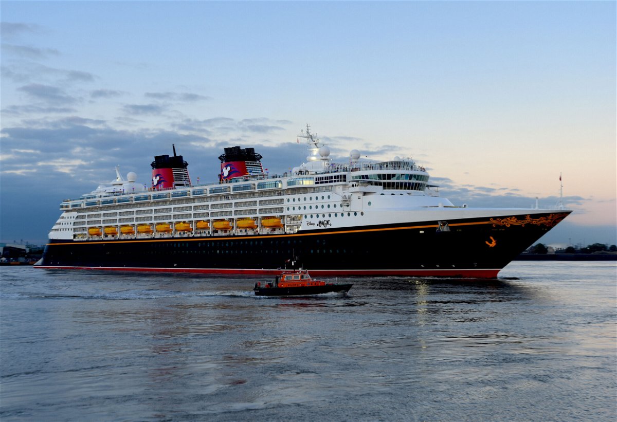 <i>Fraser Gray/Shutterstock</i><br/>Disney Cruise Line announced that all passengers ages 5 and up must be vaccinated against Covid-19 beginning in January. Disney Magic's cruise is shown here outside London.