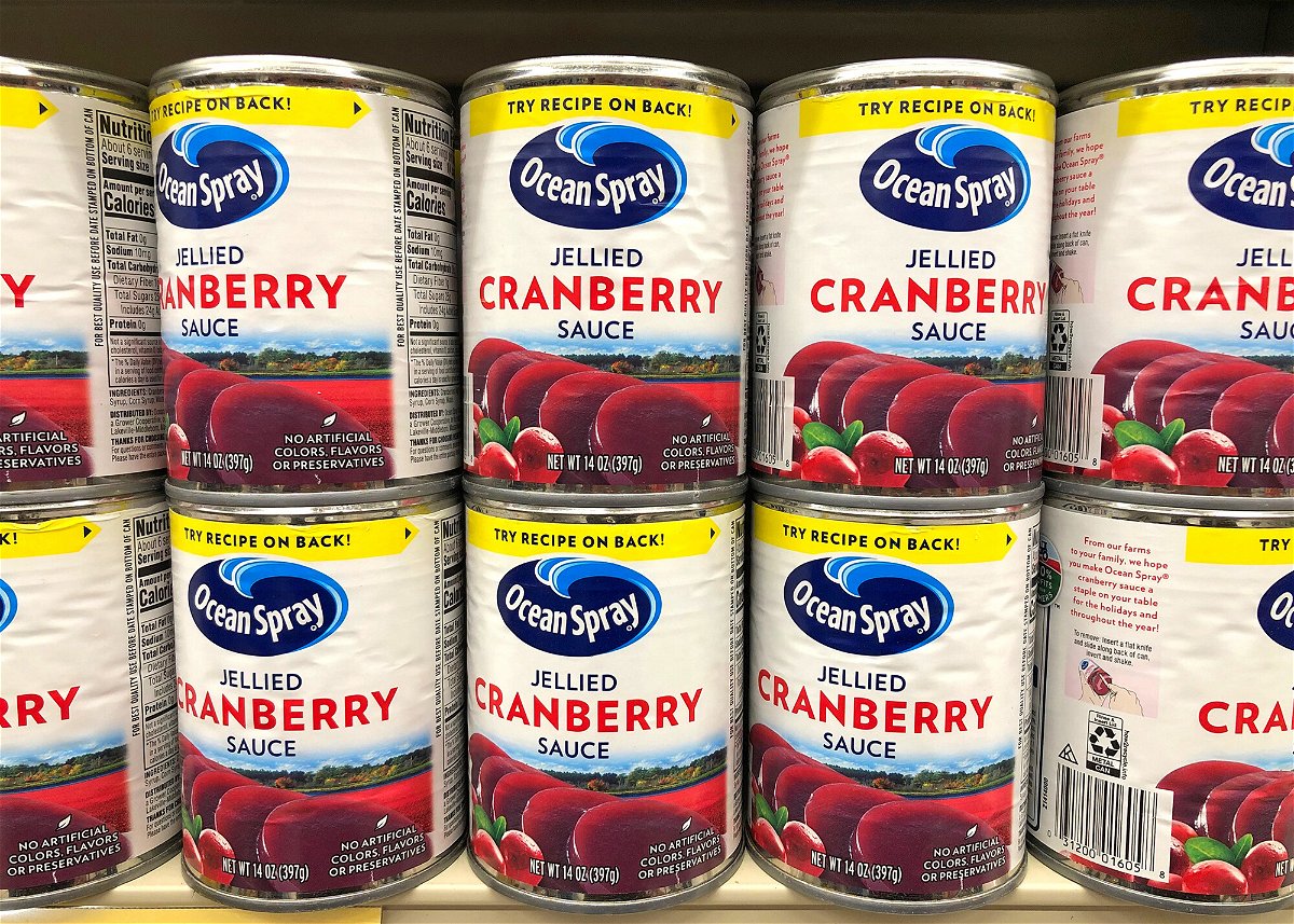 <i>Adobe Stock</i><br/>Grocery store shelf with cans of Ocean Spray brand Jellied Cranberry Sauce in Alameda