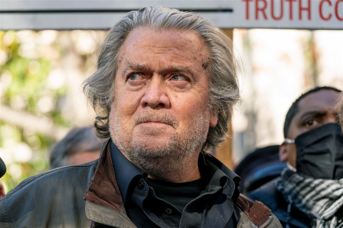 <i>Alex Brandon/AP</i><br/>Former White House strategist Steve Bannon pauses to speak with reporters after departing federal court
