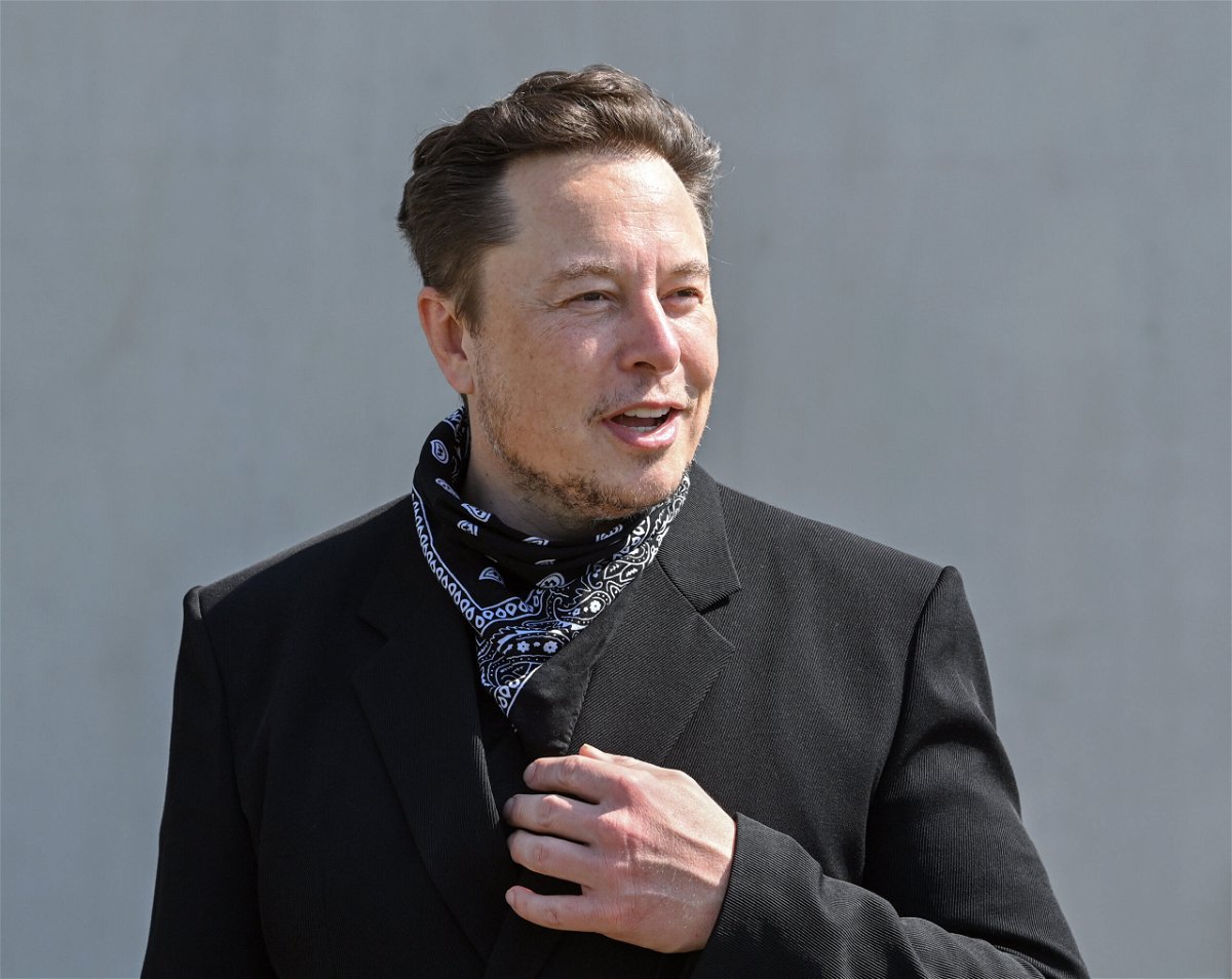 <i>Patrick Pieul/picture alliance/Getty Images</i><br/>Elon Musk says he'll let Twitter users decide if he should sell 10% of the 170.5 million shares he holds in Tesla. Musk is shown here at a press event on the grounds of the Tesla Gigafactory.