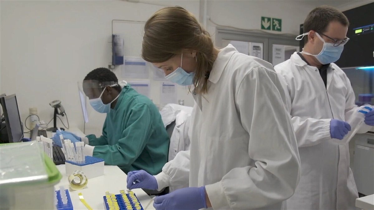 <i>EyePress News/Reuters</i><br/>Scientists work on the Covid-19 at the Centre for Epidemic Response and Innovation in KwaZulu-Natal