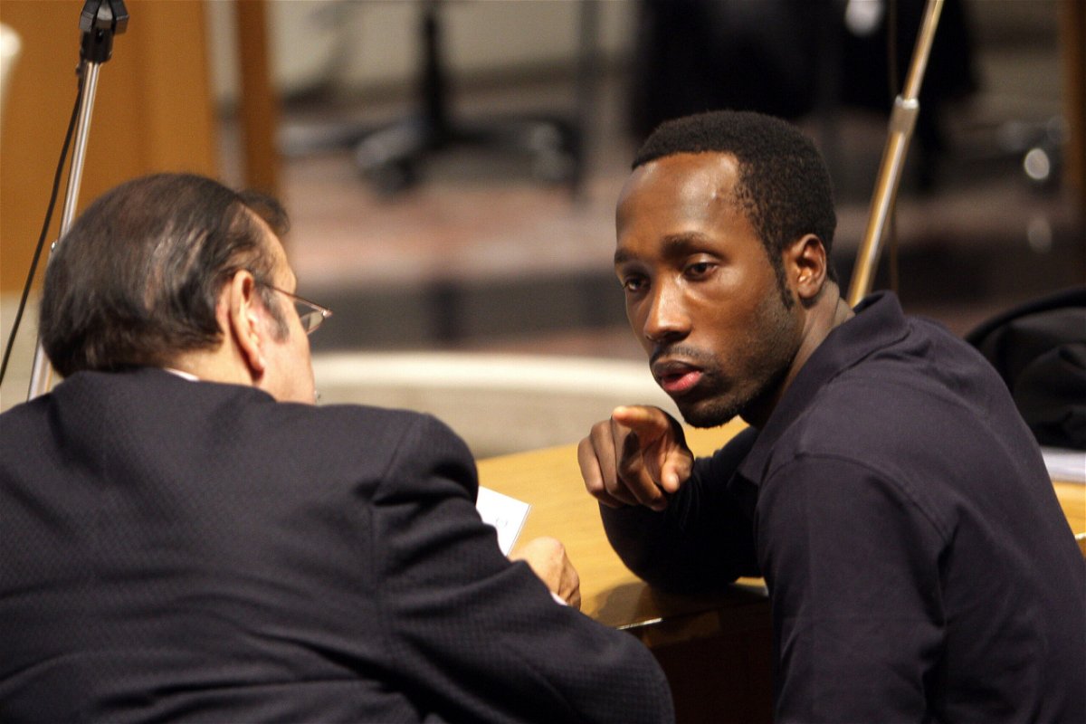 <i>Franco Origlia/Getty Images</i><br/>Rudy Guede (R) talks to his lawyer's assistant in Perugia courthouse on November 18