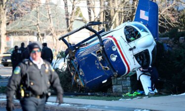 A medical helicopter rests next to the Drexel Hill United Methodist Church after it crashed in Penssylvania on January 11.