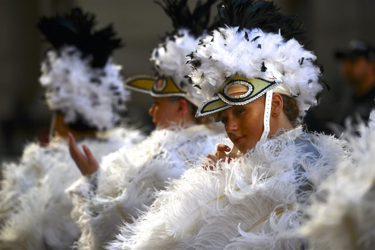 <i>Mark Makela/Getty Images</i><br/>America's oldest folk parade returns after coronavirus shut down the New Year's Day tradition that has come under scrutiny for racist and other offensive costumes worn by some participants throughout the years