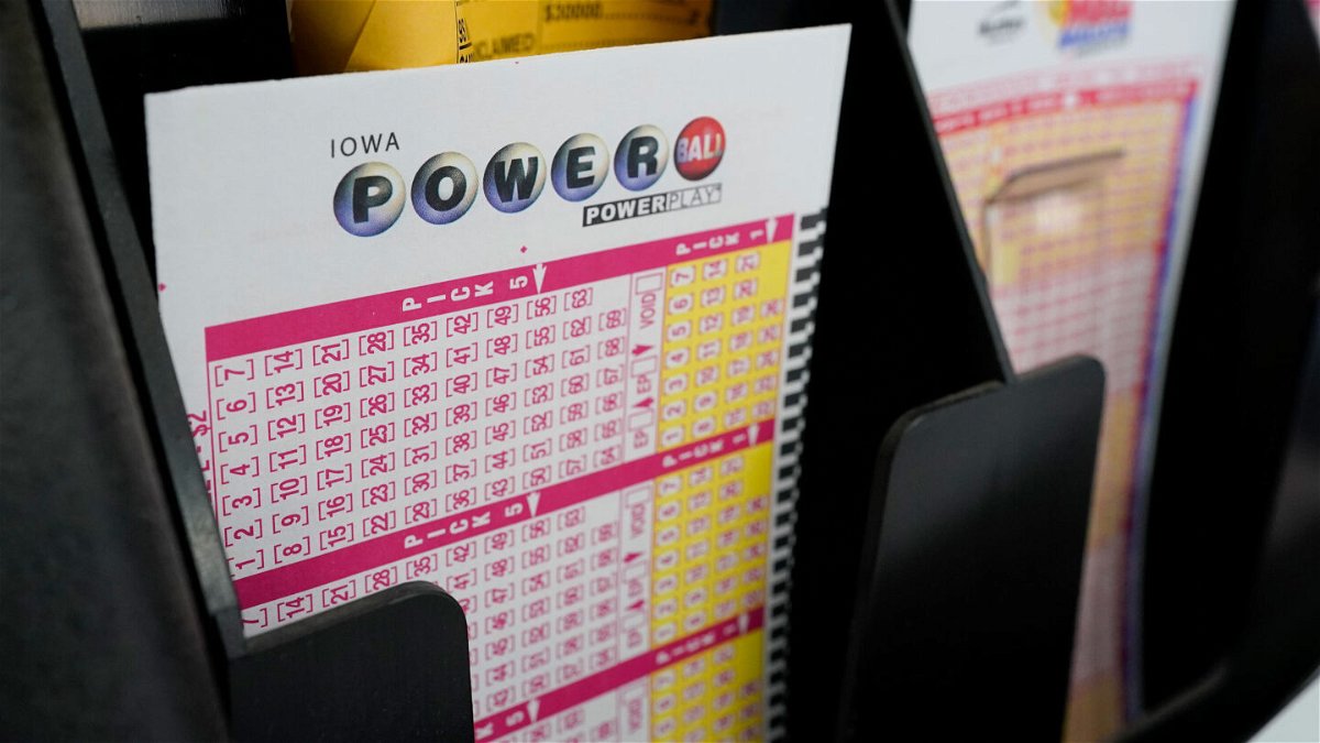 <i>Charlie Neibergall/AP</i><br/>The jackpot rolls over to an estimated $522 million for January 3