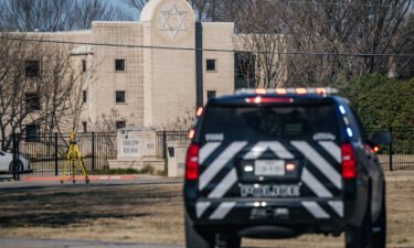 A law enforcement vehicle sits near the Congregation Beth Israel synagogue on January 16 in Colleyville