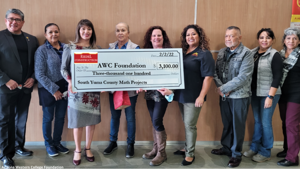 Longtime local business owner Nieves Riedel (pictured fourth from left) recently contributed $3,100 to support the South Yuma County Math Project, which provides the opportunity for middle school students to take college-level math classes taught by Arizona Western College professors. Pictured from left to right: Judge Juan Guerrero, Maria Gonzalez, AWC Associate Dean for South Yuma County Services Susanna Zambrano, Nieves Riedel, AWC Foundation Executive Director Laura Knaresboro, AWC Coordinator of Development Gladys Anaya, San Luis Council Member Juan Ponce, Veronica Zavala, and Olivia Jenkins.