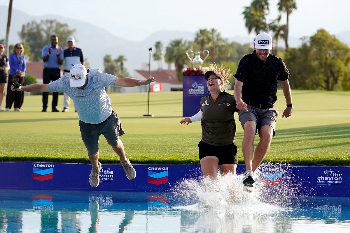 <i>Marcio Jose Sanchez/AP</i><br/>Jennifer Kupcho celebrated her first LPGA title by jumping into Poppie's Pond.
