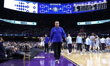 Duke head coach Mike Krzyzewski walks off the court after losing to the North Carolina Tar Heels in the 2022 NCAA Men's Basketball Tournament Final Four semifinal at Caesars Superdome Saturday in New Orleans.