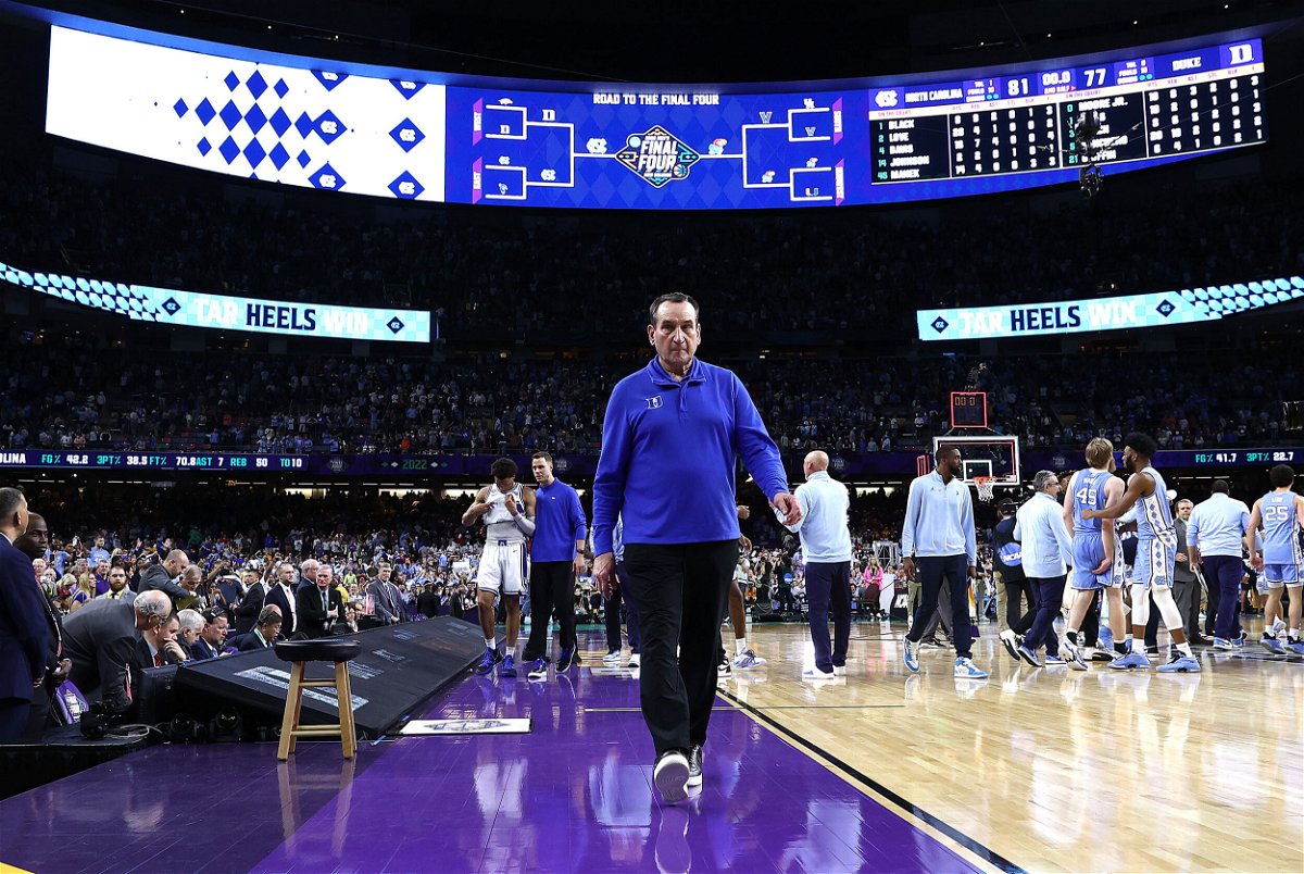 <i>Jamie Squire/Getty Images</i><br/>Duke head coach Mike Krzyzewski walks off the court after losing to the North Carolina Tar Heels in the 2022 NCAA Men's Basketball Tournament Final Four semifinal at Caesars Superdome Saturday in New Orleans.