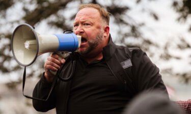 Infowars files for bankruptcy protection as founder Alex Jones faces defamation suits. Jones here addresses protesters after they stormed the Capitol Building on January 6