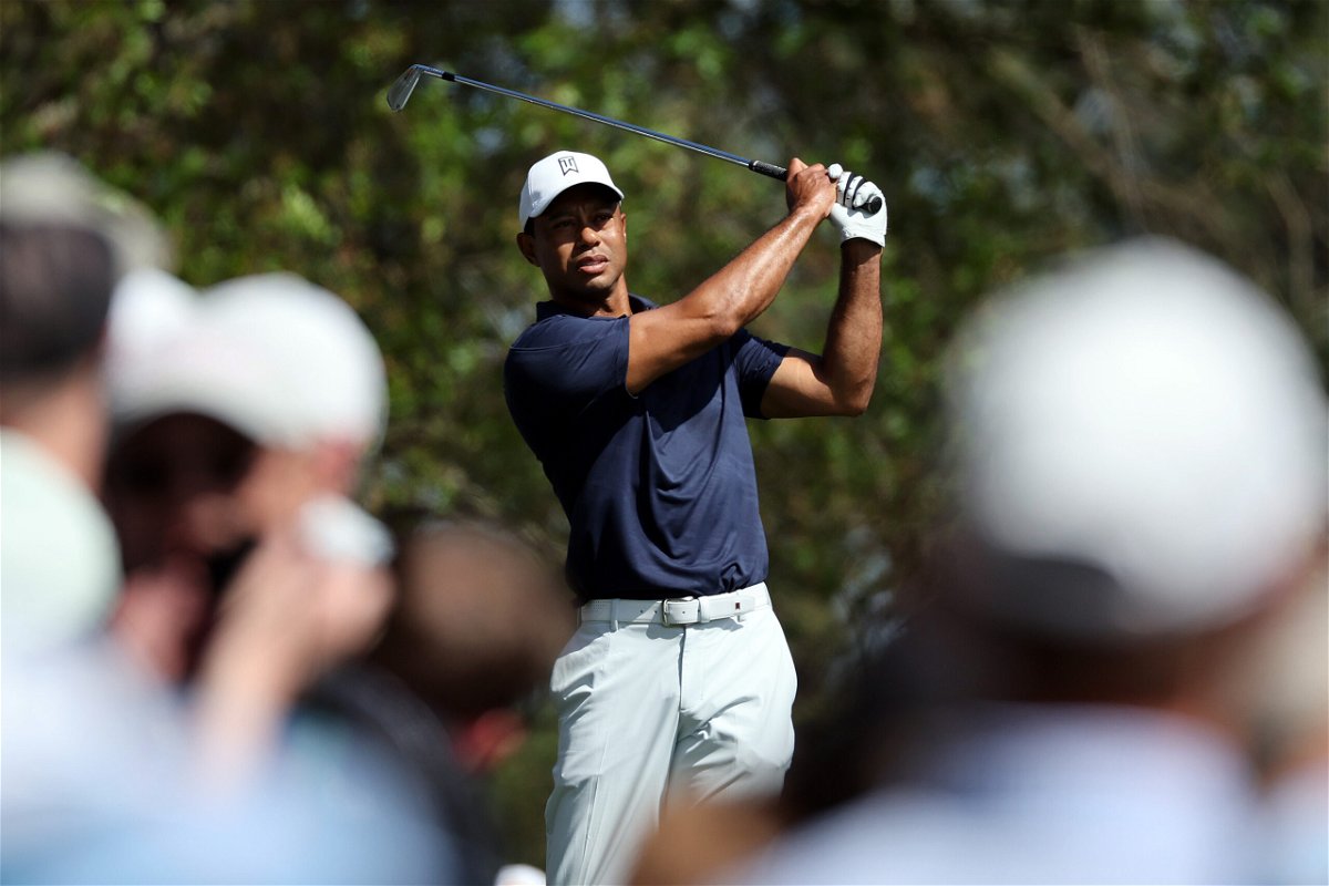 <i>Gregory Shamus/Getty Images</i><br/>Woods takes a practice swing on the fourth tee during a practice round prior to the Masters.