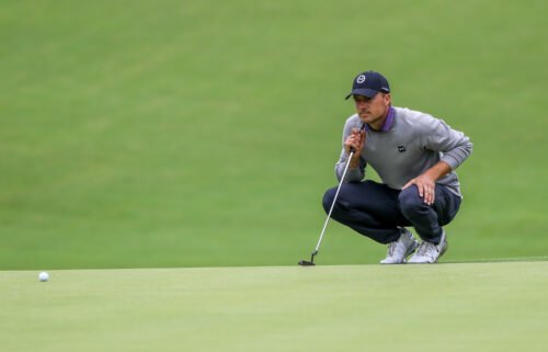 Jordan Spieth sizes up his putt on the 12th hole during the third round of the 2022 PGA Championship at Southern Hills Country Club in Tulsa