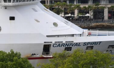 A Carnival Spirit cruise ship sits empty at Circular Quay on March 16
