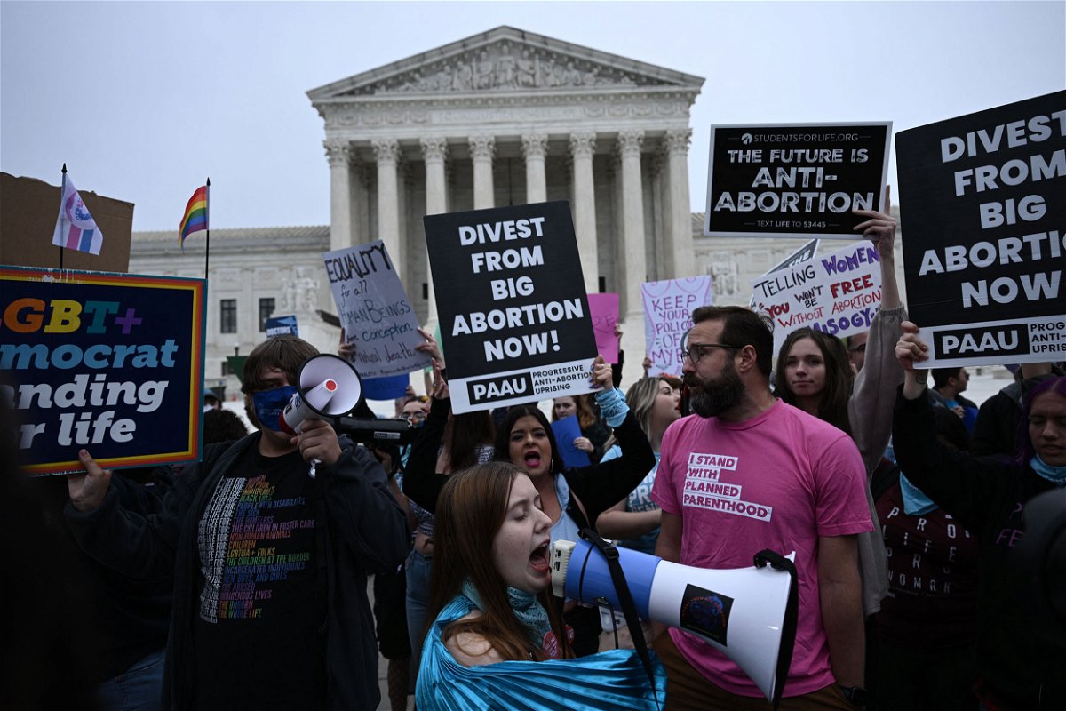 <i>Brendan Smialowski/AFP/Getty Images</i><br/>Pro-life and pro-choice demonstrators gather in front of the US Supreme Court in Washington
