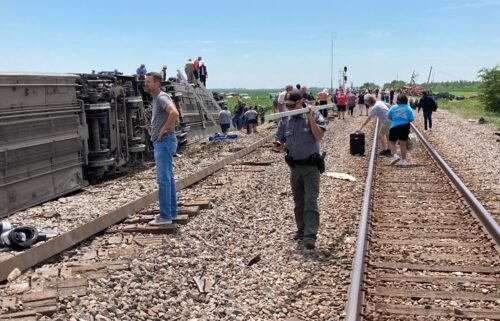 Damage from the Missouri train derailment is shown.