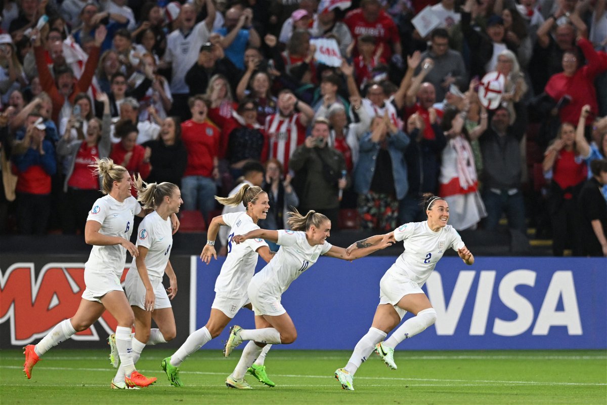 <i>JUSTIN TALLIS/AFP/AFP via Getty Images</i><br/>England celebrates after Lucy Bronze scores the second goal.