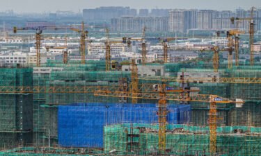 Yellow pylons work at a construction site in Jiangsu