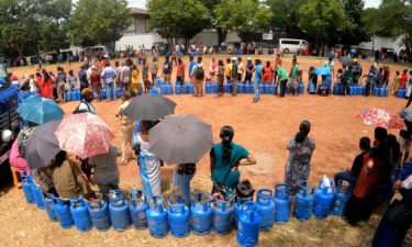 Sri Lankans wait in line for gas cylinders in Colombo.