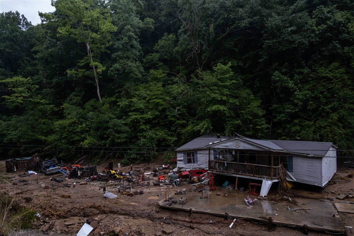 <i>Seth Herald/AFP/Getty Images</i><br/>Debris surrounds a badly damaged home near Jackson