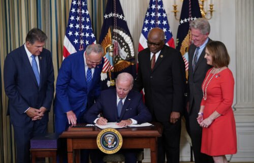 President Joe Biden signs into law the Inflation Reduction Act of 2022 during a ceremony in the State Dining Room of the White House in Washington
