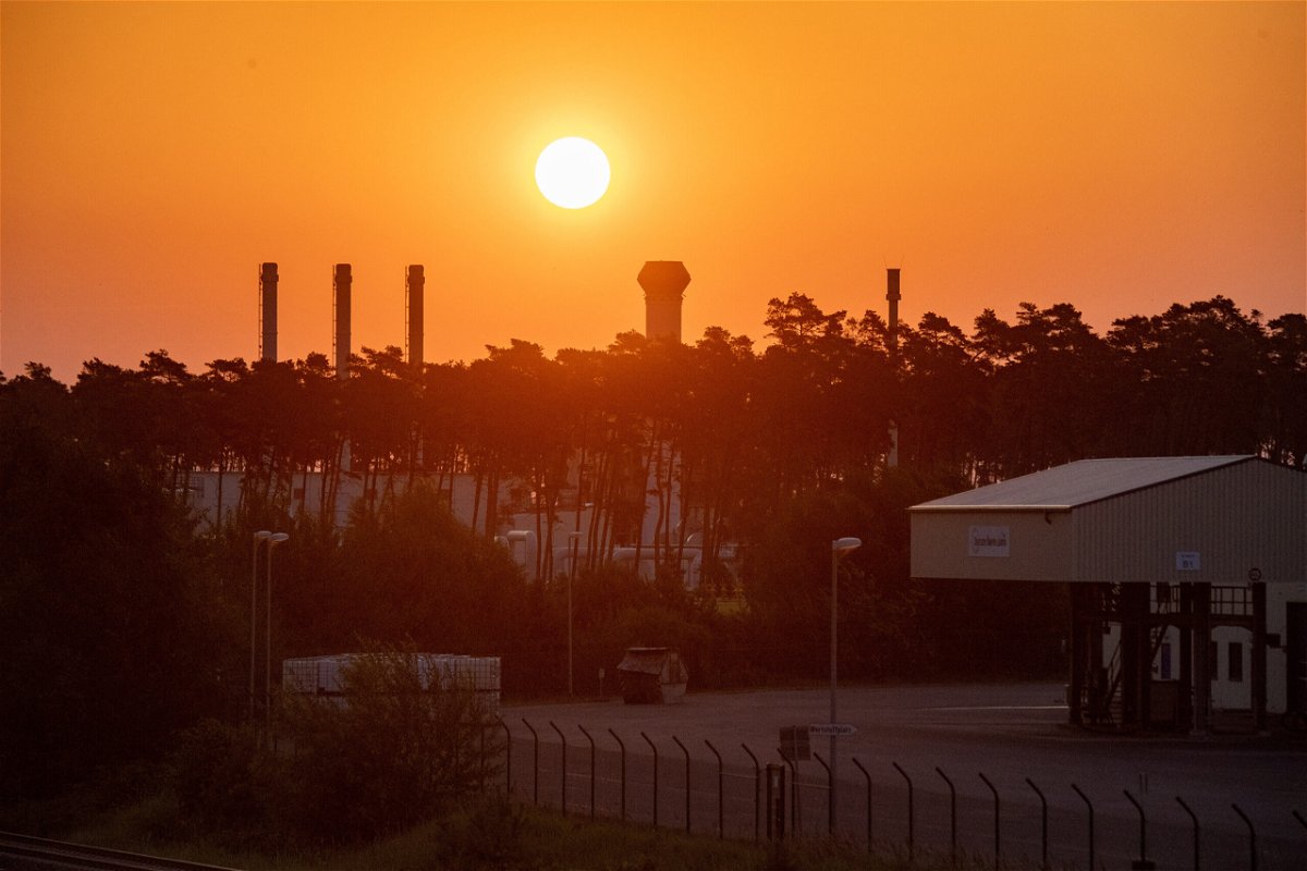 <i>Stefan Sauer/picture alliance/Getty Images</i><br/>Sunrise over the gas receiving station of the Nord Stream 1 Baltic Sea pipeline in Lubmin