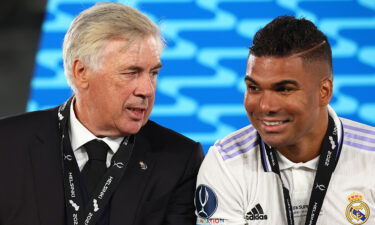 Real Madrid coach Carlo Ancelotti speaks to Casemiro following Los Blancos' Super Cup victory against Eintracht Frankfurt.