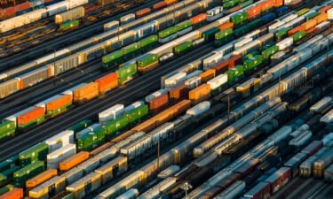 Freight railroad unions and management reached a tentative deal to avert a strike