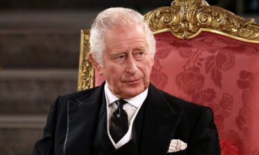 About 100 people who worked for Britain's King Charles III