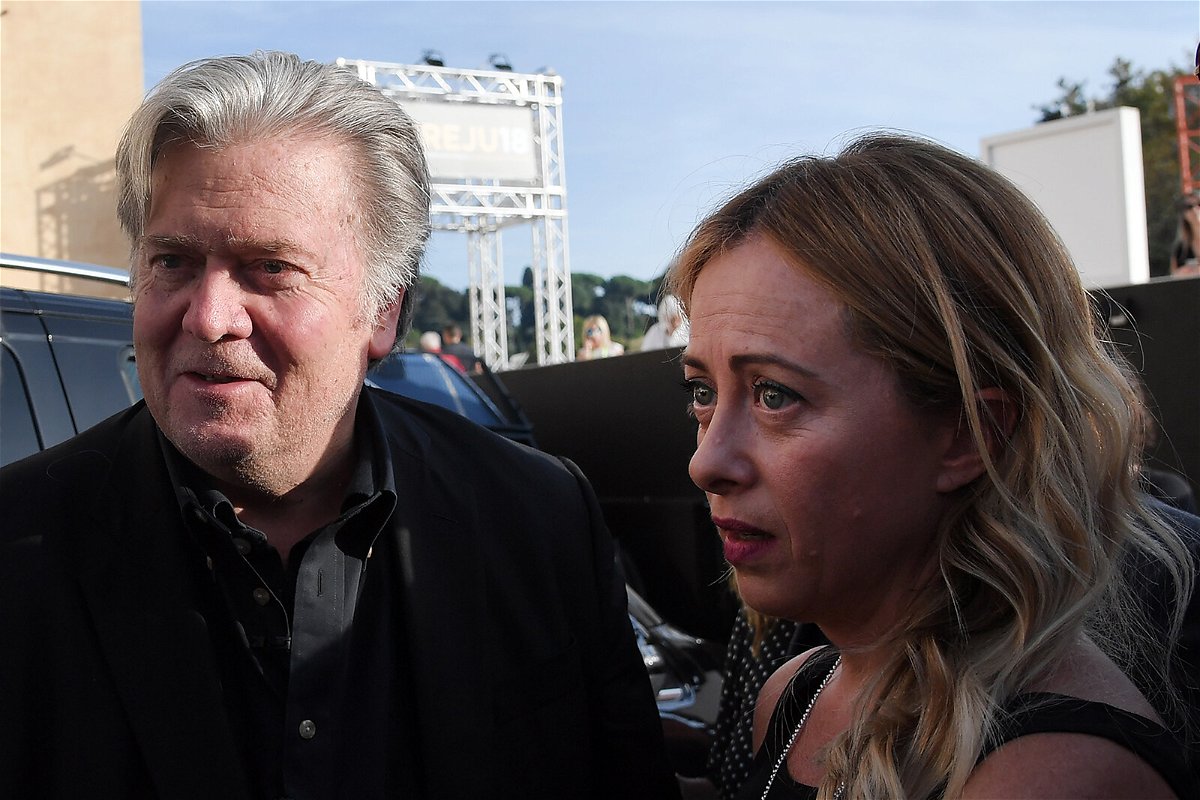 <i>Tiziana Fabi/AFP/Getty Images</i><br/>Former Trump White House chief strategist Steve Bannon (left) arrives with Giorgia Meloni to attend a congress of the Brothers of Italy party in Rome in September of 2018.