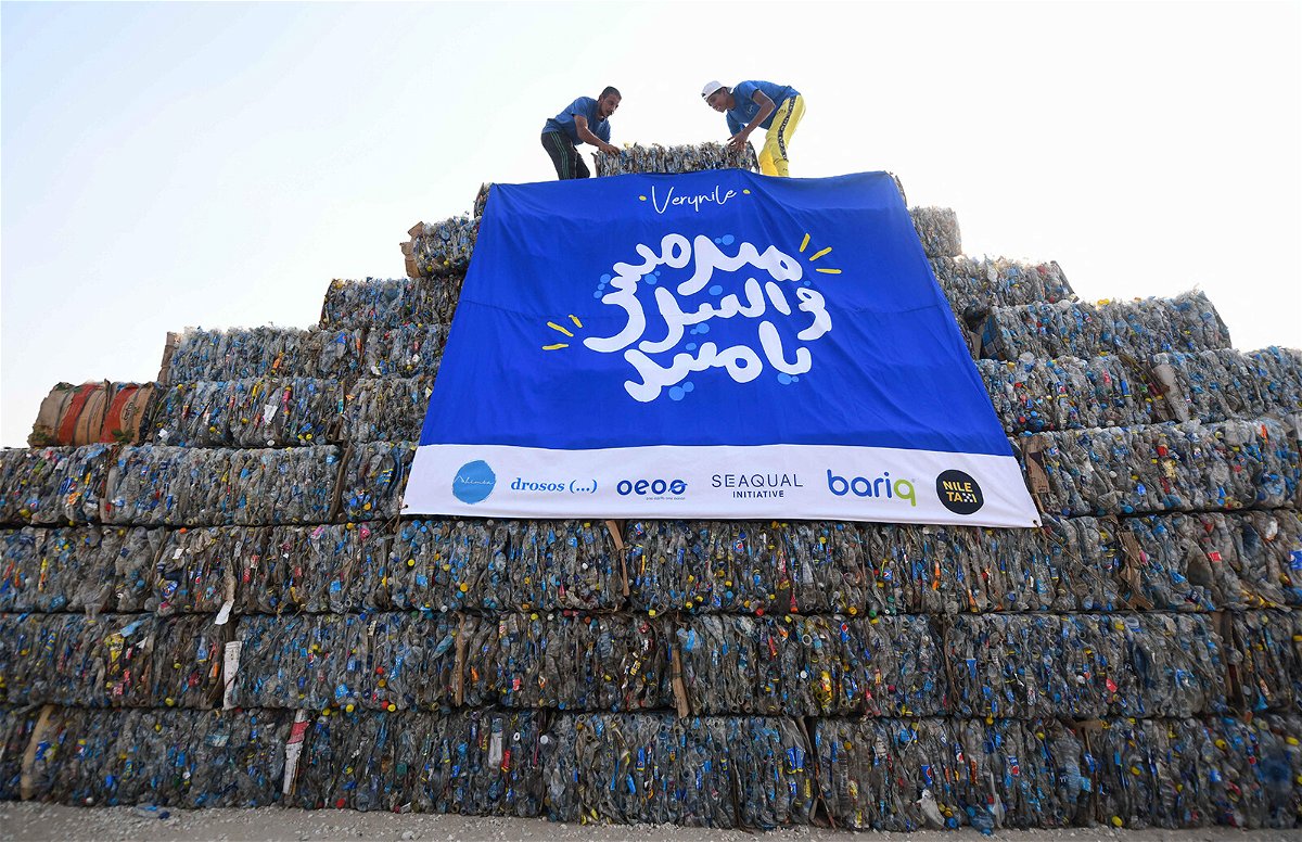 <i>AHMED HASAN/AFP/Getty Images</i><br/>Environmental volunteers build a pyramid made of plastic waste collected from the Nile river
