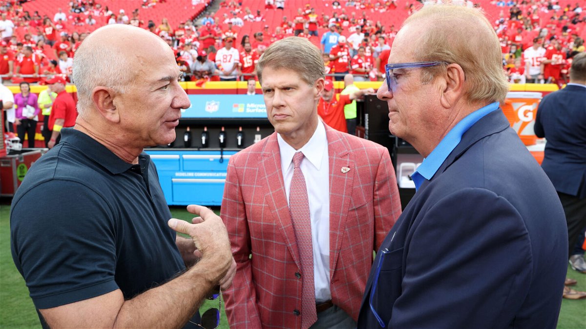 <i>Jamie Squire/Getty Images</i><br/>Jeff Bezos with Chiefs owner Clark Hunt and Chargers owner Dean Spanos ahead of a Thursday night football game at Arrowhead Stadium.