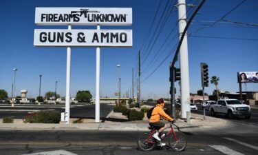 Signs of a gun store are seen in Yuma