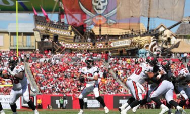 Brady looks for an open receiver during the game against the Falcons.
