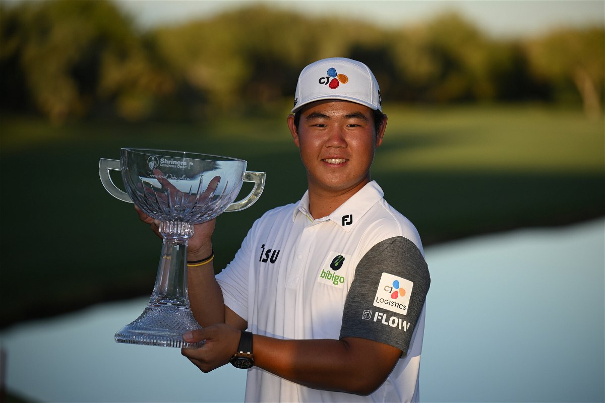 <i>Orlando Ramirez/Getty Images</i><br/>Tom Kim of South Korea poses with the trophy after winning the Shriners Children's Open at TPC Summerlin on October 09
