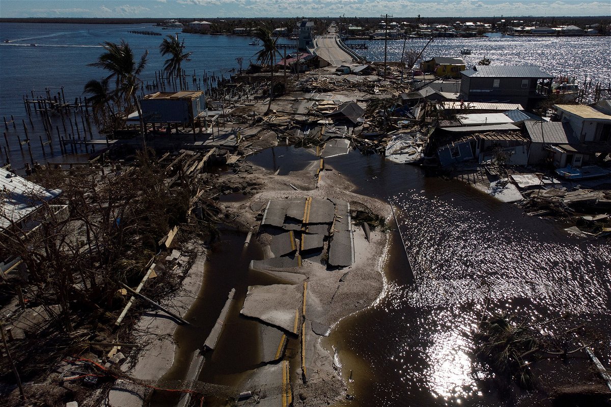 <i>Marco Bello/Reuters</i><br/>Homeowners could be hit with as much as $17 billion in uninsured losses due to flooding from Hurricane Ian due to the latest estimate on damage caused by the storm. A view of the destroyed road between Matlacha and Pine Island is seen here.