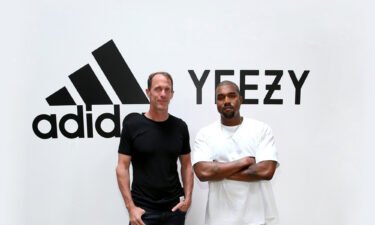 Adidas is reviewing its partnership with Kanye West after the artist lambasted the company and wore a "White Lives Matter" T-shirt in public. Adidas CMO Eric Liedtke and Kanye West are pictured here at Milk Studios in Hollywood